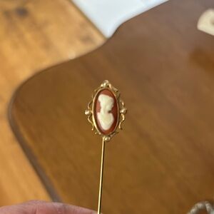 Avon Gold and White Brooch with Filigree Design